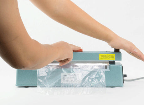 AIE Hand Impulse Sealer with Cutter in Action